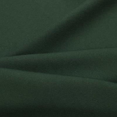 Ткань костюмная 21010 2076, 225 гр/м2, шир.150см, цвет т.зеленый - купить в Энгельсе. Цена 394.71 руб.